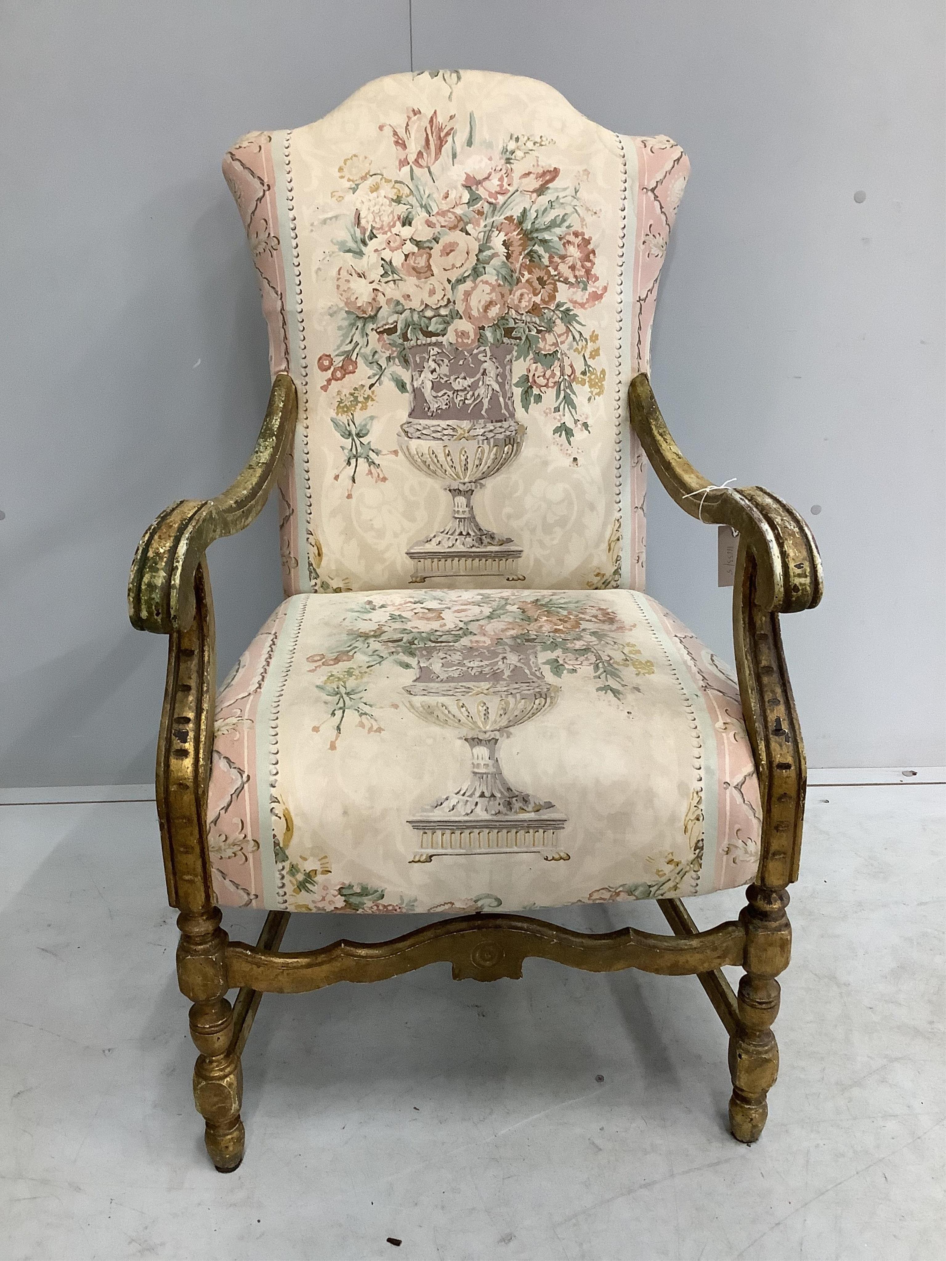 A French giltwood and tapestry open armchair, width 58cm, depth 56cm, height 102cm. Condition - fair to good